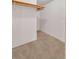 A walk-in closet with shelves and carpet at 2045 South St, Oviedo, FL 32765