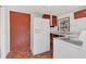 Bright eat-in kitchen with white appliances and wooden cabinets at 2045 South St, Oviedo, FL 32765