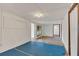 A bright living room featuring a window and doorways leading to other rooms at 2045 South St, Oviedo, FL 32765