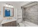 Bathroom featuring vanity, toilet, and tiled shower/bathtub combo at 209 Sweet Gum Way, Longwood, FL 32779