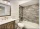 Tastefully renovated bathroom with updated vanity, sink, fixtures, and stylish tub and shower with modern tile at 209 Sweet Gum Way, Longwood, FL 32779