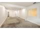 Large bedroom with neutral carpet, white trim, fan, and shuttered windows at 209 Sweet Gum Way, Longwood, FL 32779