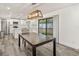 Dining area features a table and sliding glass doors leading to the outdoor space at 209 Sweet Gum Way, Longwood, FL 32779