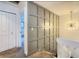 Upstairs hallway with modern wall decor, updated carpet, and natural light from modern light fixture at 209 Sweet Gum Way, Longwood, FL 32779
