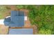 Aerial view of home displaying the roof and adjacent green landscape at 2137 Brighton Ln, Orlando, FL 32817