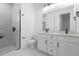 Stylish bathroom featuring double vanity and glass enclosed shower at 2137 Brighton Ln, Orlando, FL 32817