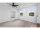Bright bedroom features carpeted floors, neutral walls, and large windows offering natural light at 2137 Brighton Ln, Orlando, FL 32817