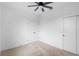 Bedroom features carpeted floors, neutral walls, and white trim doors at 2137 Brighton Ln, Orlando, FL 32817