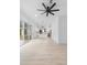 Bright living room with ceiling fan and view to kitchen at 2137 Brighton Ln, Orlando, FL 32817