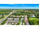 Aerial view showcasing nearby ponds, lush greenery, and well-maintained neighborhood streets at 2157 Cypress Villas Dr, Orlando, FL 32825