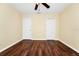 Bedroom with laminate wood flooring and two large closets at 2157 Cypress Villas Dr, Orlando, FL 32825