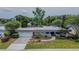 An aerial view showcases this well-maintained home with a lush front yard and attached garage at 2171 Chippewa Trl, Maitland, FL 32751