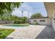 Private backyard featuring a refreshing pool with an updated patio area for outdoor enjoyment at 2171 Chippewa Trl, Maitland, FL 32751