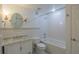 All white renovated bathroom with marble vanity and subway tile at 2171 Chippewa Trl, Maitland, FL 32751