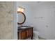 Bathroom with a tiled shower, wood vanity, and neutral flooring at 2171 Chippewa Trl, Maitland, FL 32751