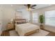 Cozy bedroom featuring natural light, neutral tones, and warm wood accents at 2171 Chippewa Trl, Maitland, FL 32751