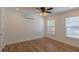 Neutral bedroom with hardwood floors, mini-split air conditioning, and natural light at 2171 Chippewa Trl, Maitland, FL 32751