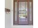 Charming front door with sidelights and decorative mailbox, offering curb appeal at 2171 Chippewa Trl, Maitland, FL 32751
