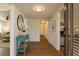 Bright hallway with hardwood floors and an inviting view into the adjacent living spaces at 2171 Chippewa Trl, Maitland, FL 32751
