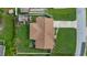 Birds eye view of home and its fenced, well-maintained yard at 2316 Irlo Dr, Kissimmee, FL 34741