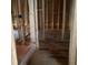 Bathroom under construction exhibiting floor and stud framing at 2383 Zuni Road, St Cloud, FL 34771
