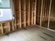 Framing of a room with visible window and studs with electrical wiring at 2383 Zuni Road, St Cloud, FL 34771