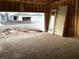 Garage interior under construction with stud framing at 2383 Zuni Road, St Cloud, FL 34771