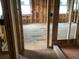 Room framing shows electrical wiring, studs, and a window at 2383 Zuni Road, St Cloud, FL 34771