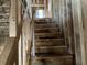Under-construction staircase features wooden framing and temporary treads leading to the next level at 2383 Zuni Road, St Cloud, FL 34771