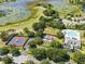 Enjoy tennis, shuffleboard, and swimming in this vibrant community at 25409 Waterbrook Ct, Leesburg, FL 34748