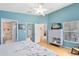 Inviting bedroom with views to other rooms, natural light and a ceiling fan at 25409 Waterbrook Ct, Leesburg, FL 34748