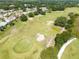 Enjoy golfing in this community with a challenging and beautiful golf course and sand traps at 25409 Waterbrook Ct, Leesburg, FL 34748
