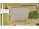 Aerial view of roof and well maintained lawn of home, plus view of nearby street at 2541 Bobby Lee Ln, St Cloud, FL 34772