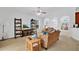 Comfortable living area with neutral decor, perfect for relaxing and entertaining guests at 2541 Bobby Lee Ln, St Cloud, FL 34772