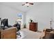 Bright office space with natural light, neutral carpet flooring and ample room to work at 2541 Bobby Lee Ln, St Cloud, FL 34772