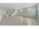 Spacious living room showcasing neutral paint, tile flooring, and plenty of natural light at 2724 Amanda Kay Way, Kissimmee, FL 34744