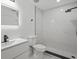 This bathroom has modern fixtures, marble-look tiling in the glassed shower, and a floating vanity at 274 W 20Th St, Apopka, FL 32703