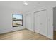 The bedroom has light wood floors, two closets for storage, and a window for natural light at 274 W 20Th St, Apopka, FL 32703