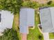 Overhead shot of the house showcasing the roof, driveway, and surrounding landscaping at 3008 Pinnacle Ct, Clermont, FL 34711