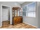 Dining area featuring a wood china cabinet and a window for natural light at 3008 Pinnacle Ct, Clermont, FL 34711