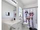 Bathroom with a giraffe-themed shower curtain and a large vanity at 310 Cornwallis Ct, Kissimmee, FL 34758