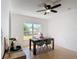 Bright dining area with modern table setting, stylish chairs, and contemporary lighting at 310 Cornwallis Ct, Kissimmee, FL 34758