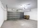 Spacious two car garage with an automatic door and a clean concrete floor ready for parking and storage at 310 Cornwallis Ct, Kissimmee, FL 34758