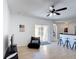 Living room with a view to the outdoors and bar stool seating at the countertop at 310 Cornwallis Ct, Kissimmee, FL 34758