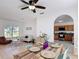 Open-concept living and dining areas seamlessly connect to a modern kitchen for easy living and entertaining at 310 Cornwallis Ct, Kissimmee, FL 34758