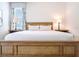 Inviting bedroom showcasing a well-crafted wooden bed and neutral decor that promotes a relaxing atmosphere at 311 W Falls Dr, Kissimmee, FL 34747