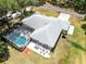Aerial view of house, expansive back yard, pool, and patio at 3285 Majestic Oak Dr, St Cloud, FL 34771