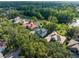 An aerial view showing the home's proximity to a pond at 3352 Park Grove Ct, Longwood, FL 32779