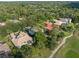 An aerial view showing the home's proximity to a golf course at 3352 Park Grove Ct, Longwood, FL 32779