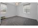 Neutral bedroom showcasing great natural light with carpeted floors and ceiling fan at 3352 Park Grove Ct, Longwood, FL 32779